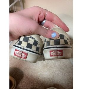 Checkered vans.